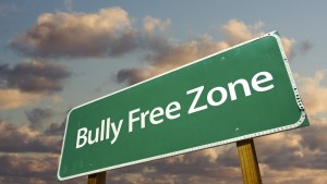 Bully Free Zone Green Road Sign And Clouds
